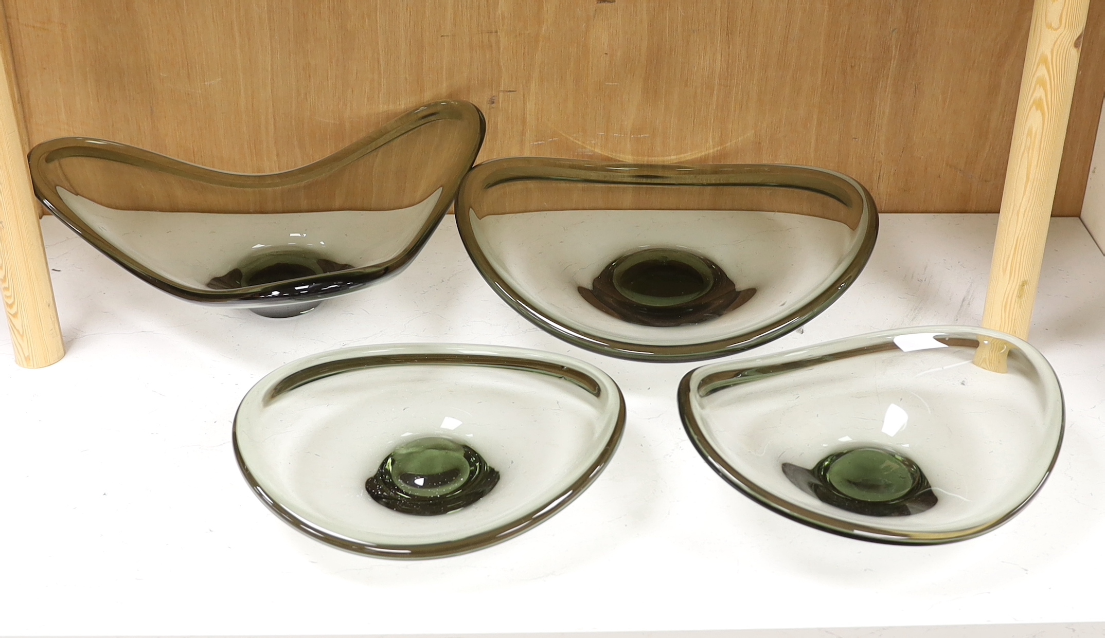 Four Holmegaard glass dishes, largest 39cm